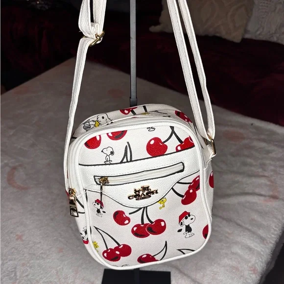 Cherry and Snoopy Print Backpack with small cross body bag. - Picture 7 of 8